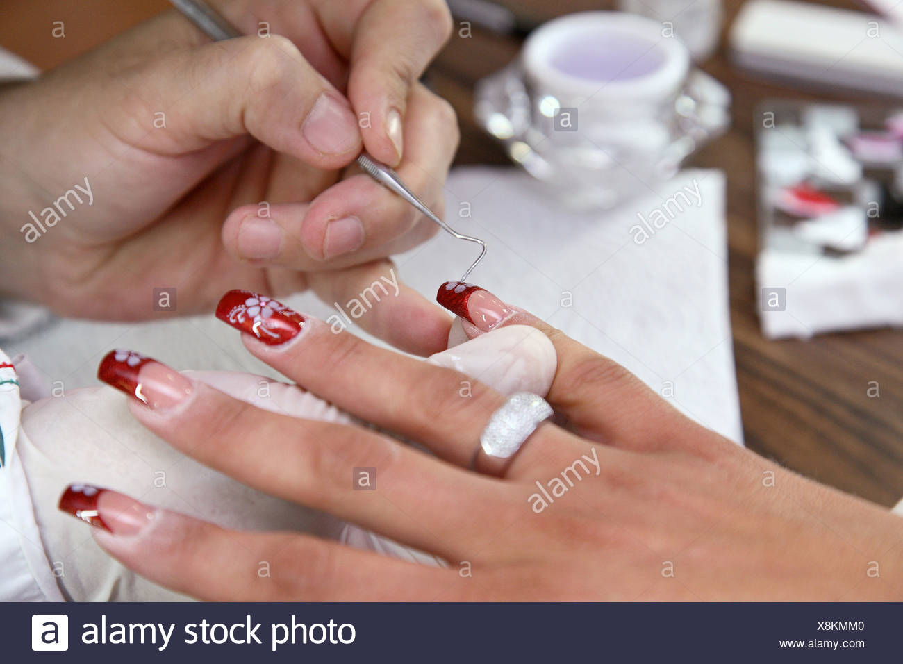 Berlin Germany A Nail Designer Decorated Nails With Glitter Stock