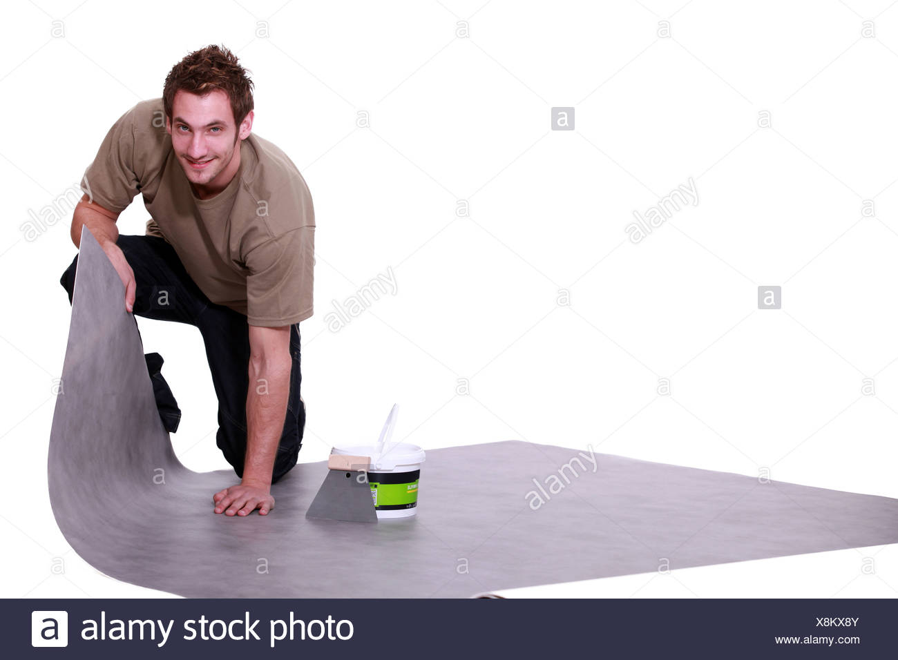 Man Putting Down Linoleum Flooring Stock Photo 280720859 Alamy