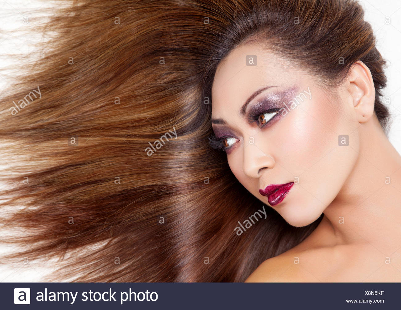 Beautiful Young Thai Woman With Long Elegant And Shiny Straight