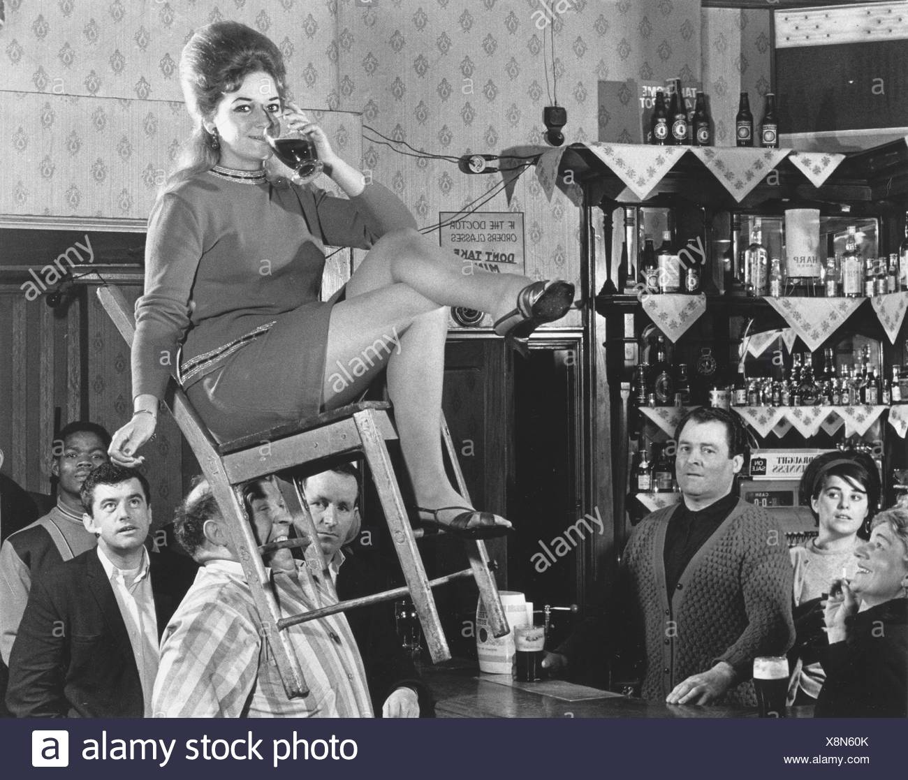 Man Lifts Woman On Your Chair Only With His Teeth England Great Britain Stock Photo Alamy