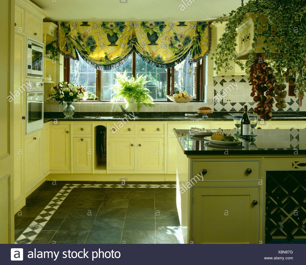 Yellow Fitted Eighties Kitchen With Yellow And Blue Patterned
