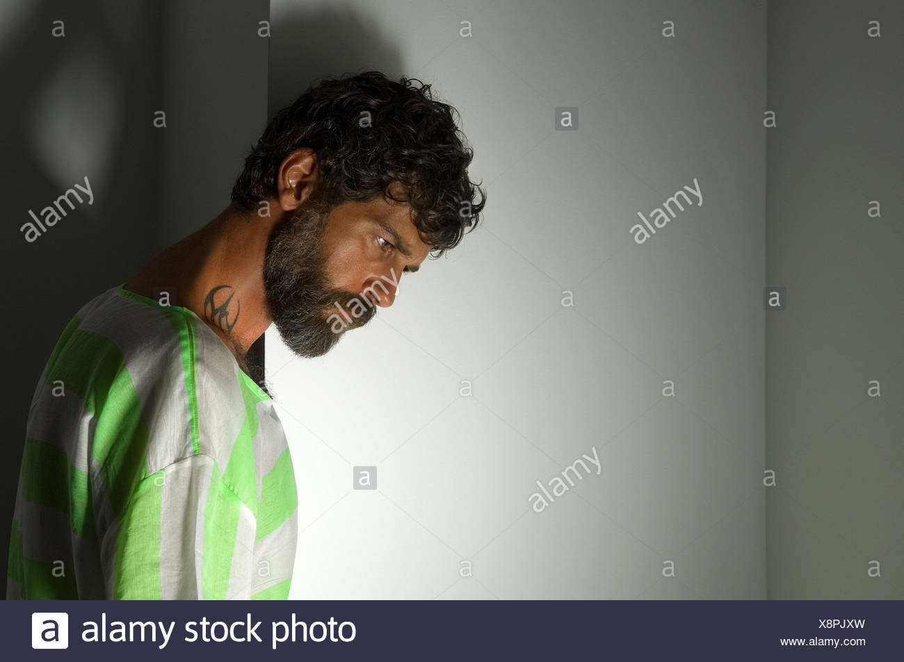 Portrait of a bearded man with a tattoo Stock Photo