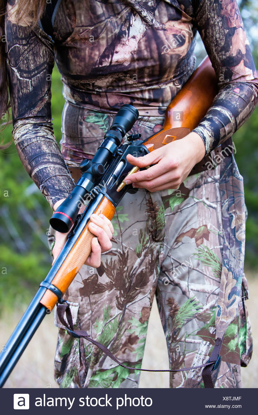 Young Woman With Hunting Rifle High Resolution Stock Photography and ...