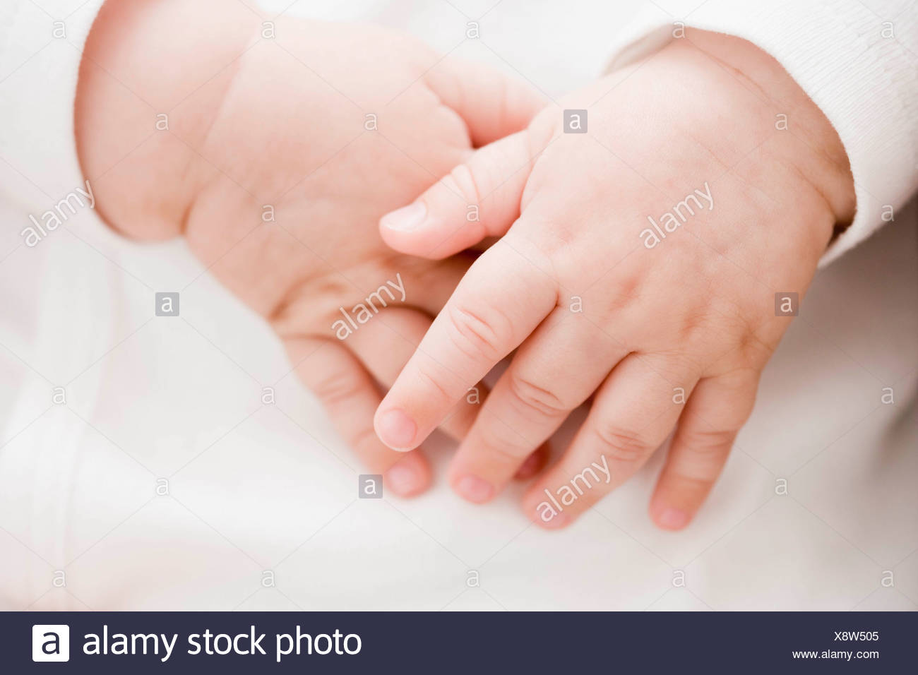 Baby Hands Stock Photo Alamy