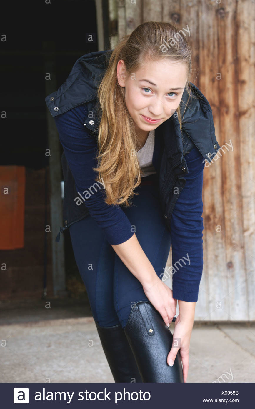 girl in riding boots
