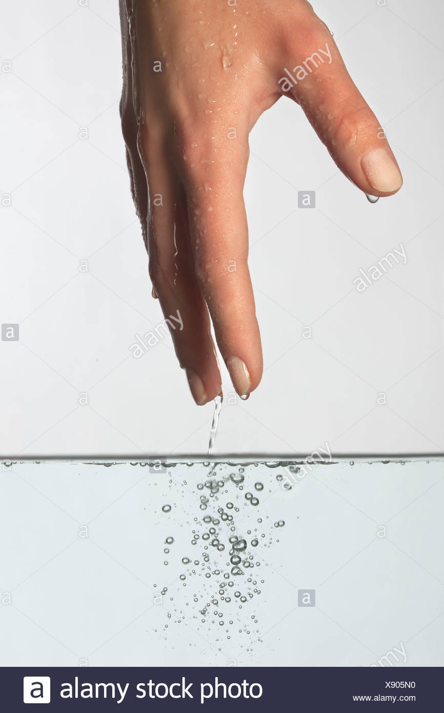 Water Dripping Hand Stock Photos & Water Dripping Hand Stock Images Alamy