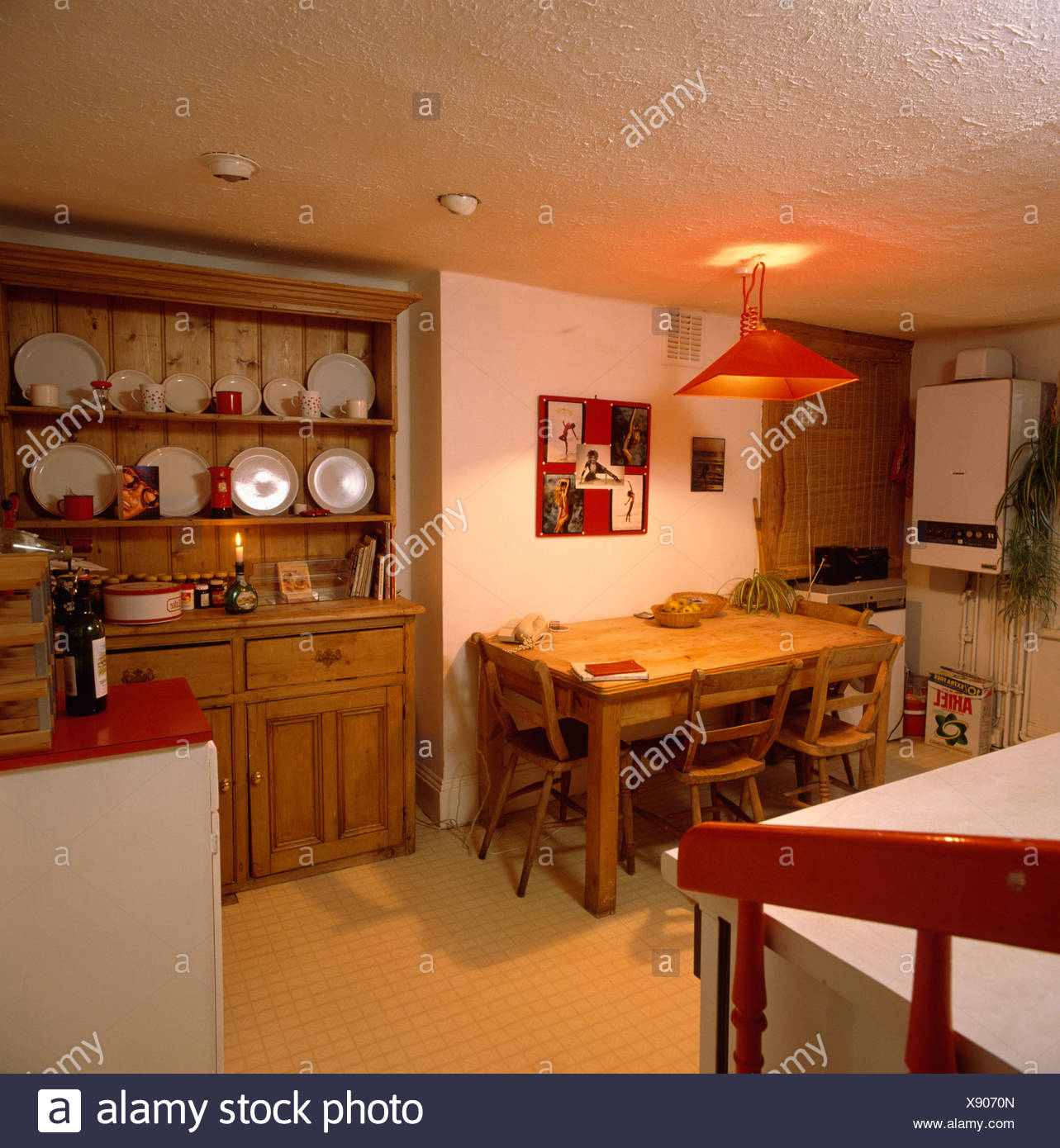 Pine Table And Dresser In Cottage Kitchen Diningroom With Artex