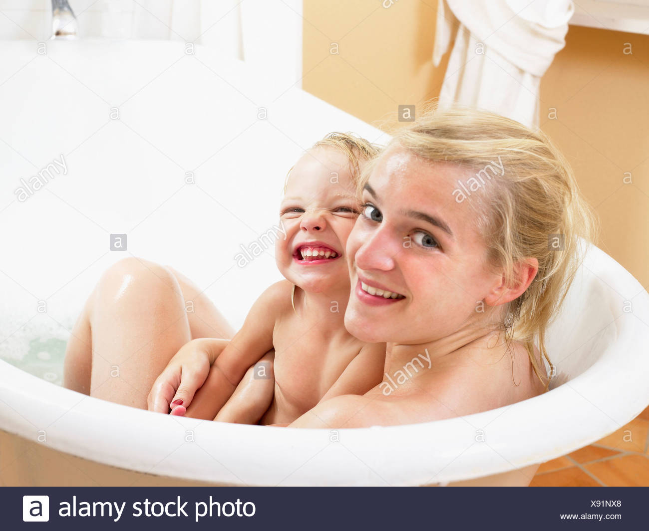 mother daughter bathing