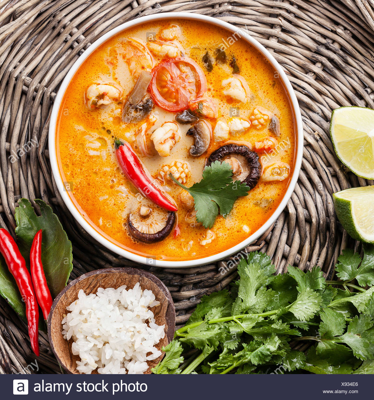 Spicy Thai Soup Tom Yam With Coconut Milk Chili Pepper And Seafood Stock Photo Alamy