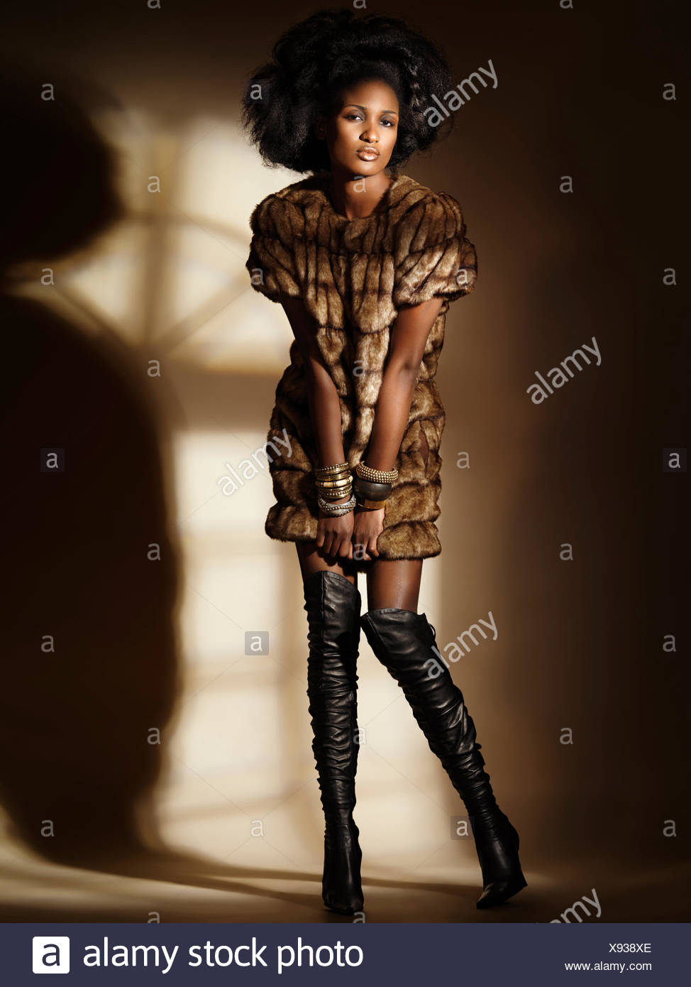 Wearing A Full Length Fur Coat High Resolution Stock Photography and ...