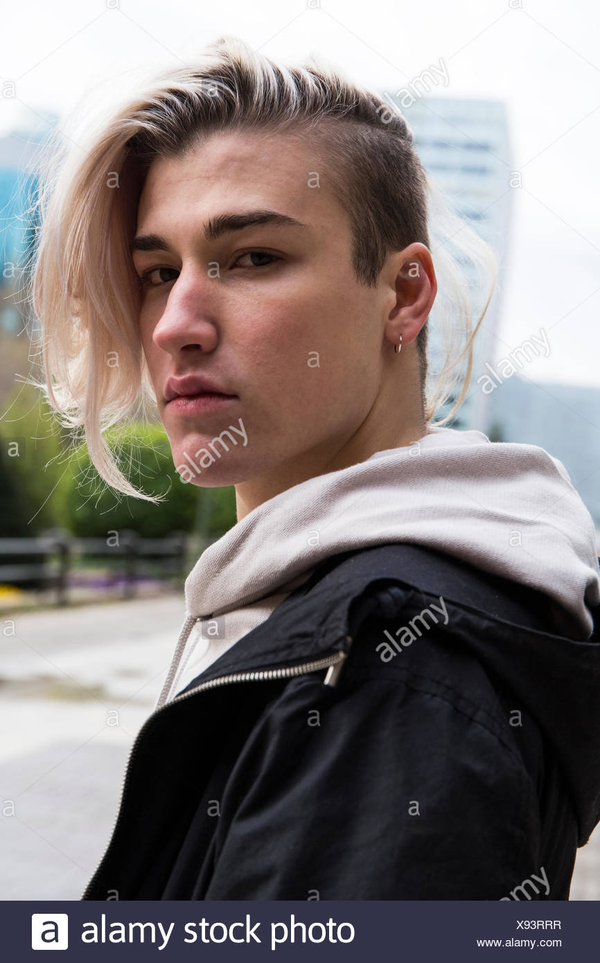 Portrait Of Serious Young Man With Dyed Hair Stock Photo
