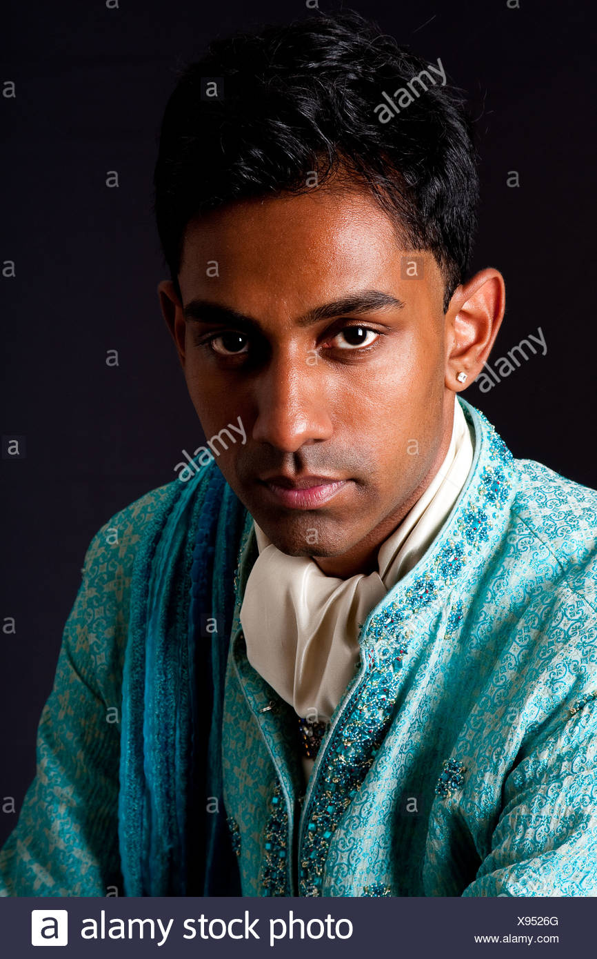 Beautiful Face Of An Indian Hindu Young Man With Earring Wearing Blue Dhoti Portrait Of Beautiful Face Of An Indian Hindu Young Man With Earring Wearing Blue Dhoti Portrait Of