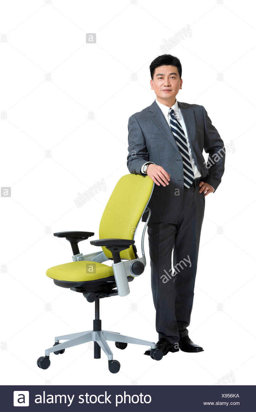 Business Man Standing Next Chair High Resolution Stock Photography And Images Alamy
