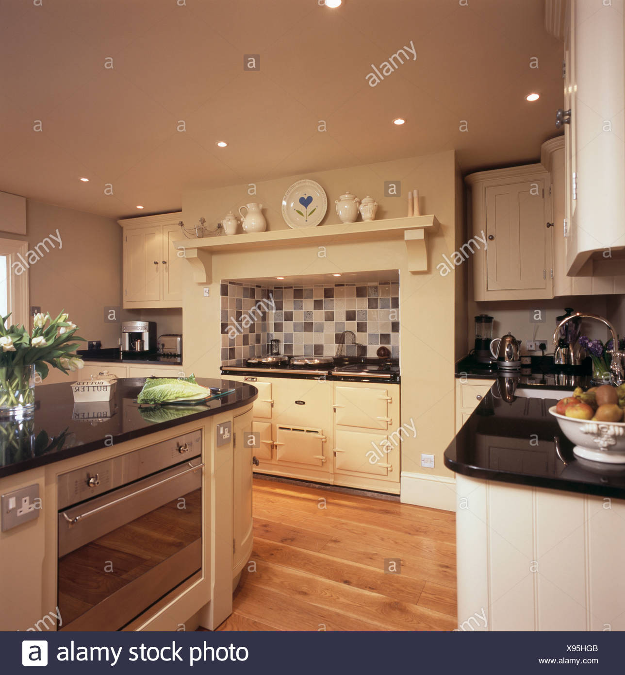 Cream Aga Oven In Country Kitchen With Built In Oven In Island