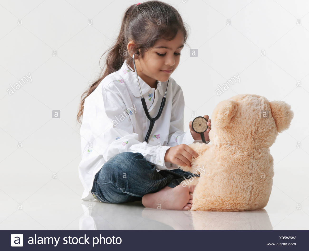 Young girl playing doctor, petite sizes formal dress