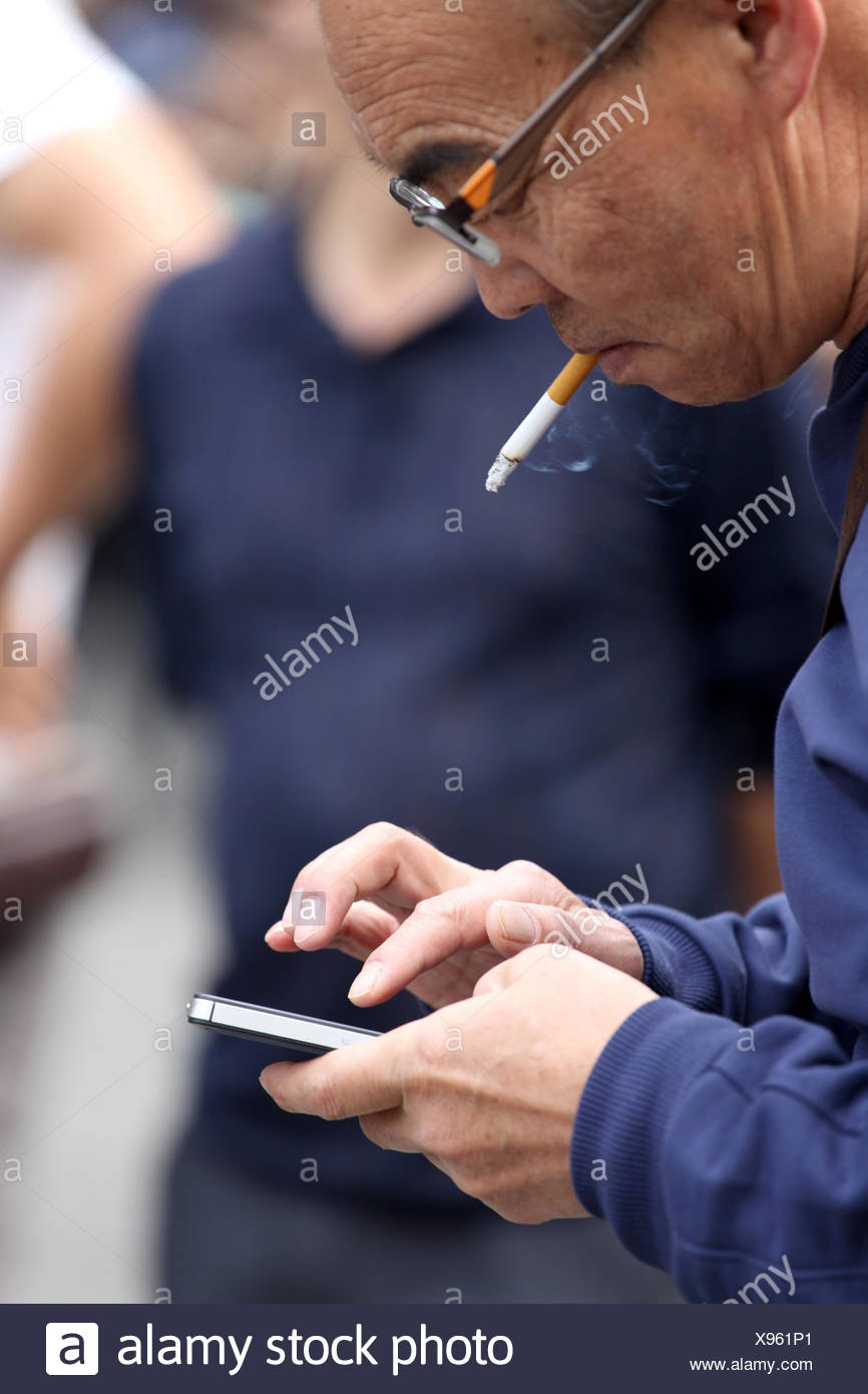 Men Smoking Cigarettes Stock Photos & Men Smoking Cigarettes Stock ...