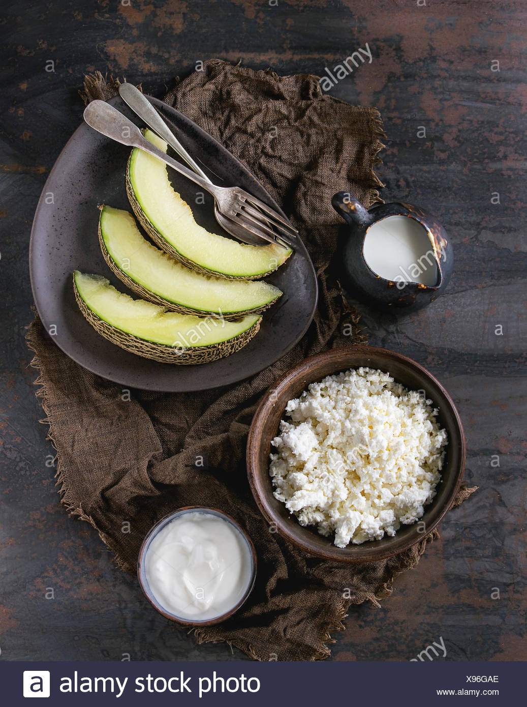 Ceramic Bowl Of Homemade Cottage Cheese With Yogurt Jug Of Milk