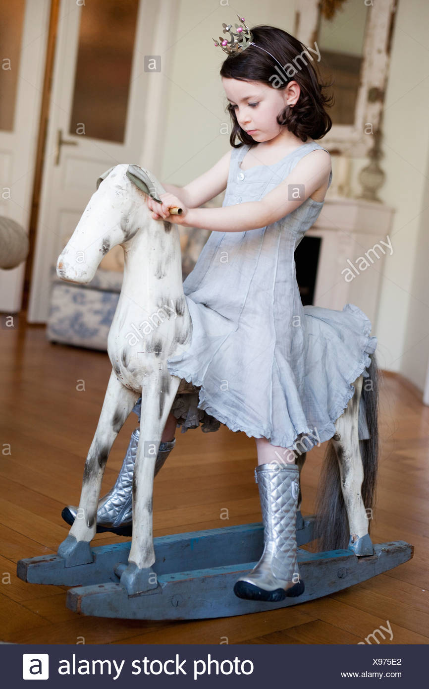 little girl rocking horse