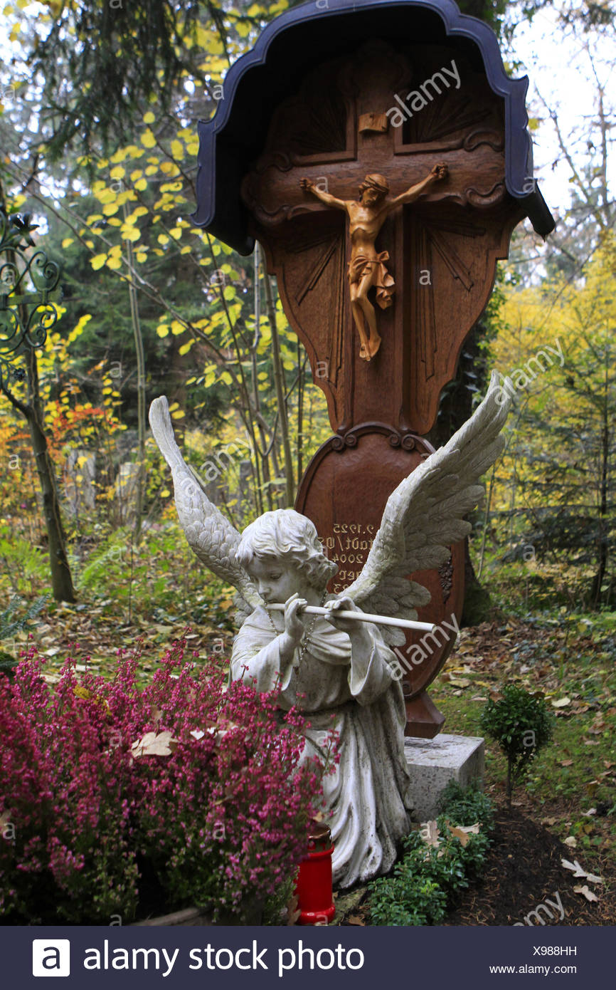 Geschmuecktes Grab auf einem Friedhof an Allerheiligen Stock Photo