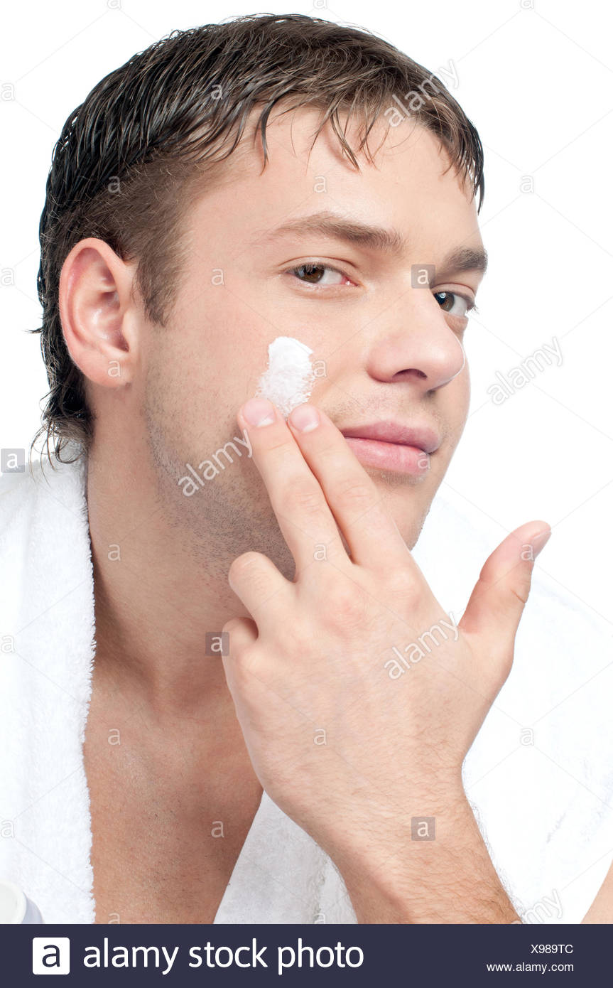 putting lotion on face