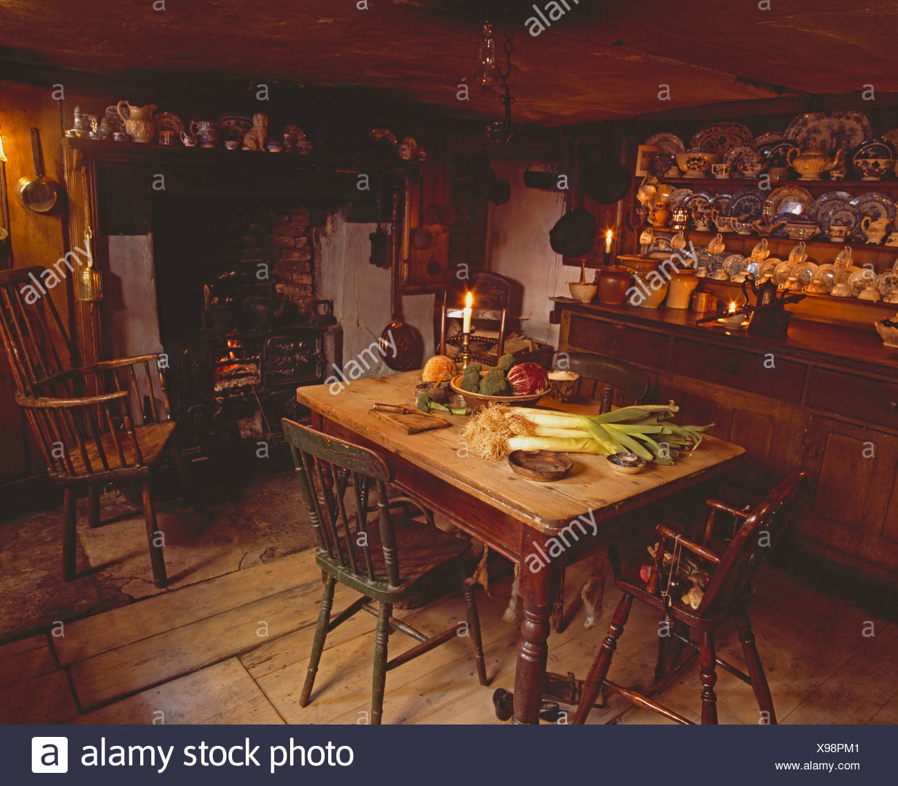 Vegetables On Scrubbed Pine Table In Low Ceilinged Old Fashioned