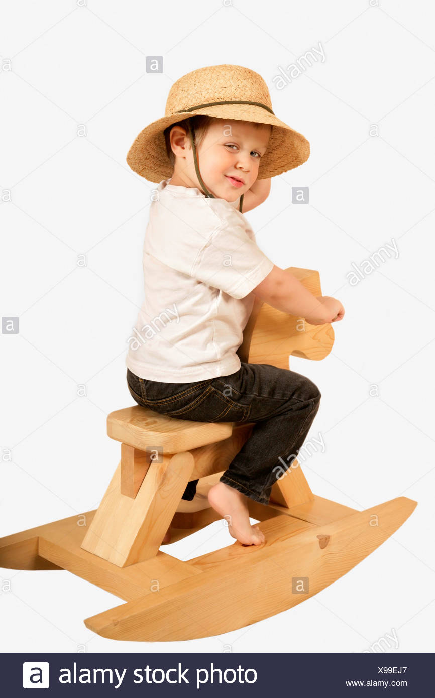 child on rocking horse
