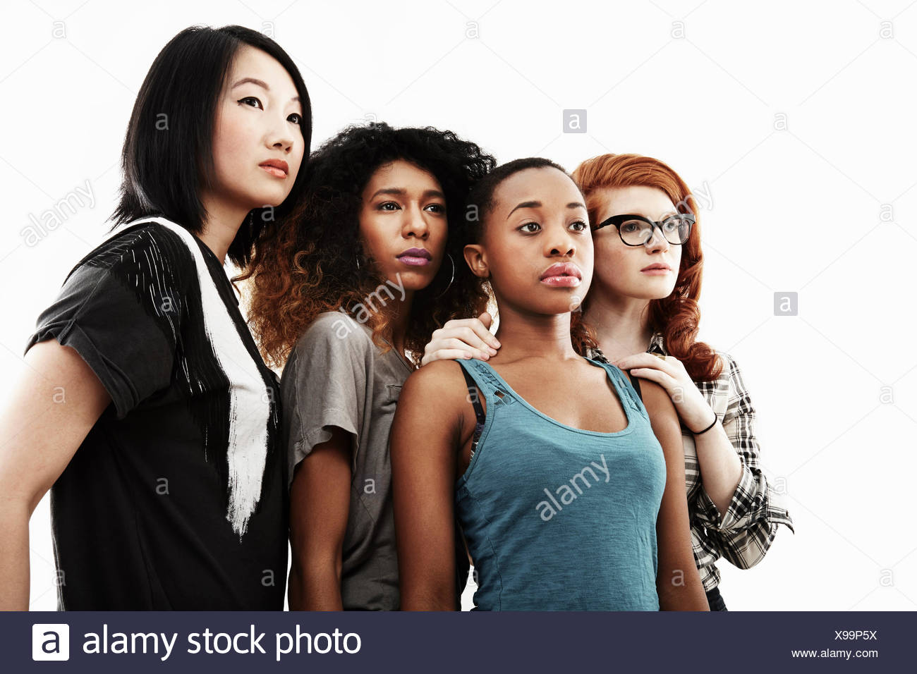 Studio portrait of four serious young women Stock Photo