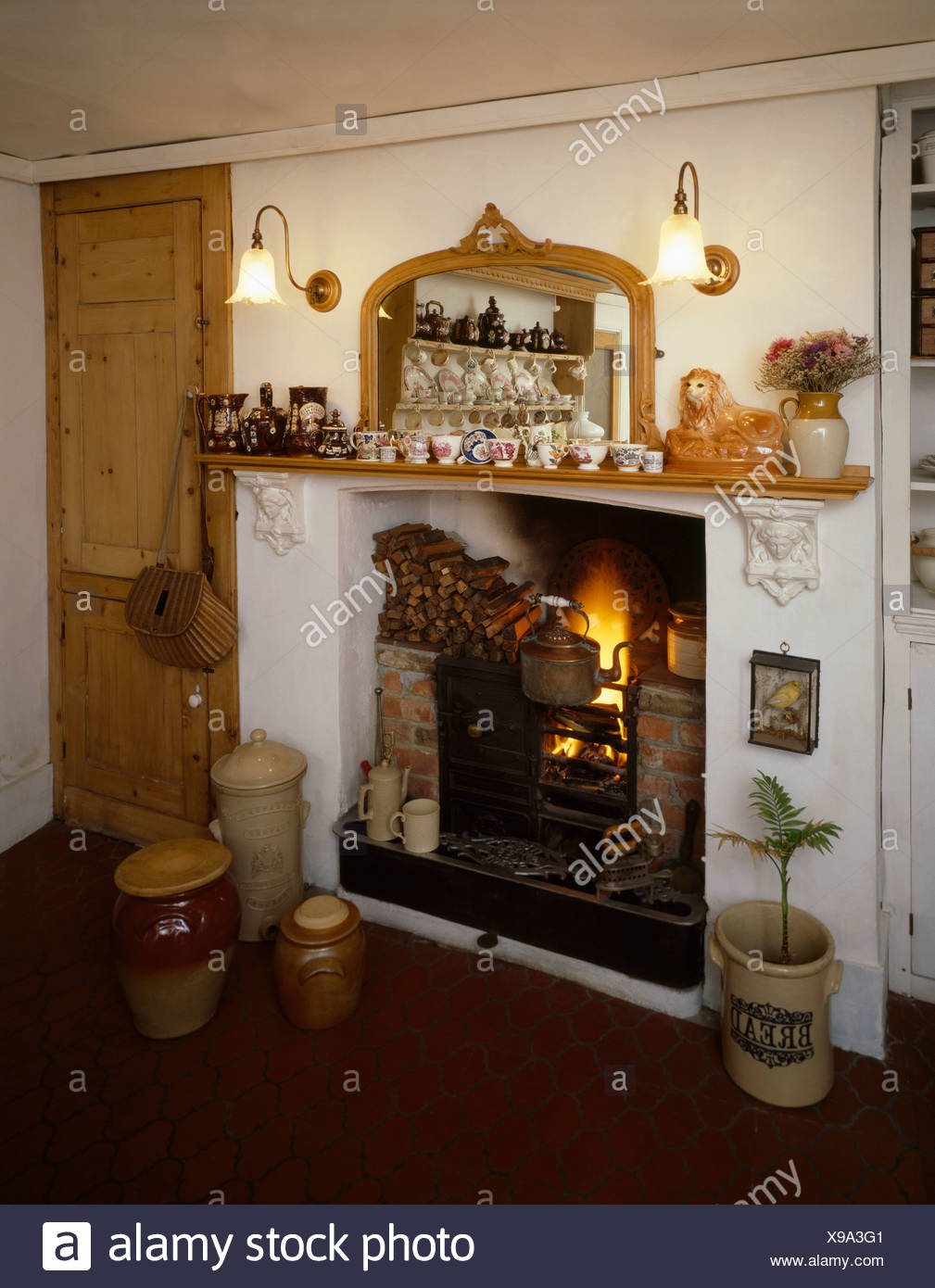 Wall Lights With Glass Shades On Either Side Of Mirror Above