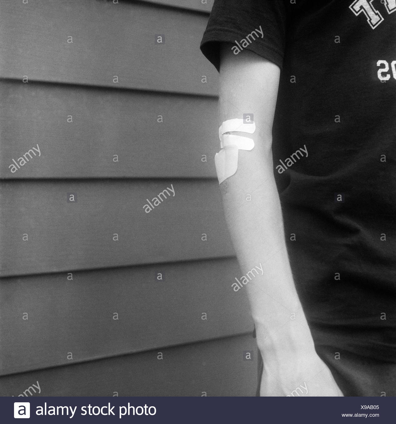 Bandage Arm Black and White Stock Photos & Images - Alamy