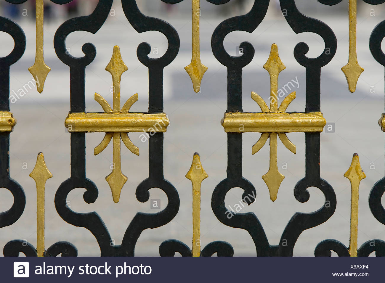 Wrought Iron Fence With Gilded Decoration At The Royal