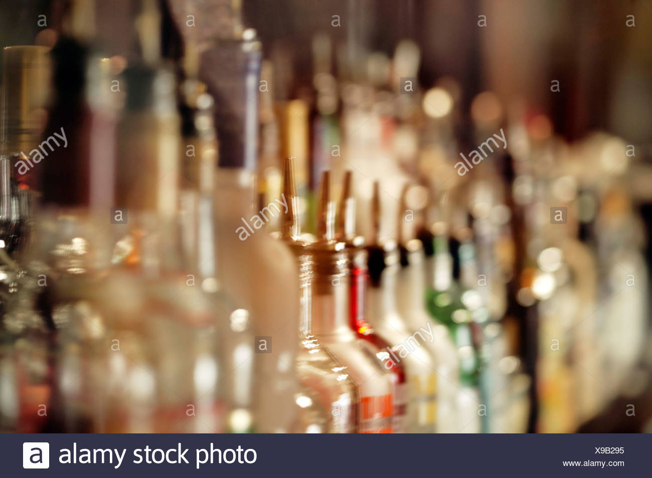 Bottles Behind A Bar Stock Photos & Bottles Behind A Bar Stock Images