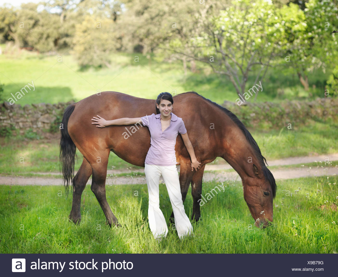 Girl Caressing Horse High Resolution Stock Photography and Images Alamy