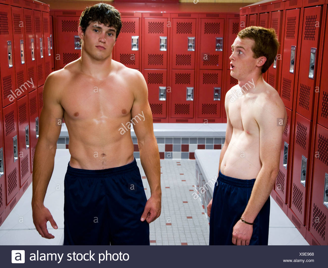Two High School Students In A Locker Room Stock Photo