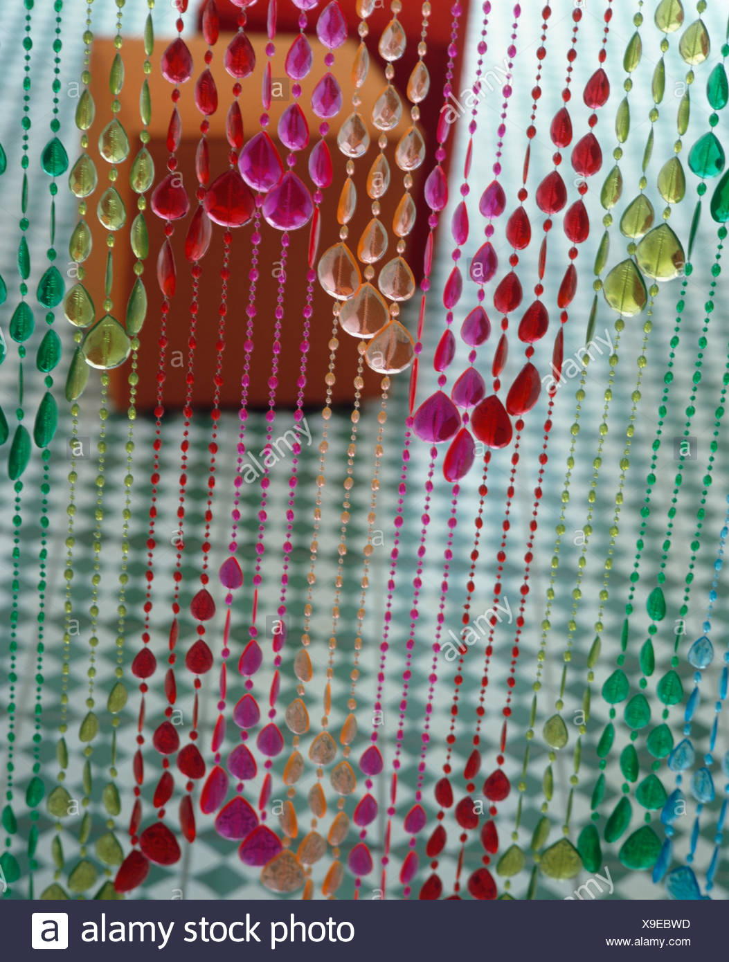 Close Up Of Pink And Lime Green Glass Beaded Curtain Stock Photo
