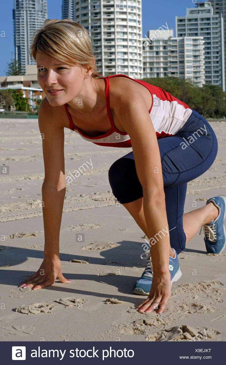 Female Short Blonde Hair Red And White Vest Top Blue Leggings