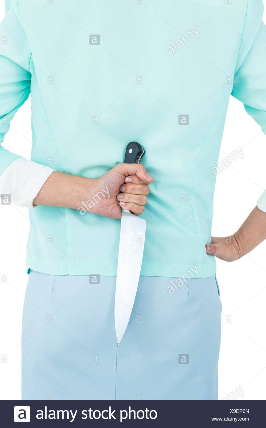 Knife Behind Back Stock Photos & Knife Behind Back Stock Images Alamy