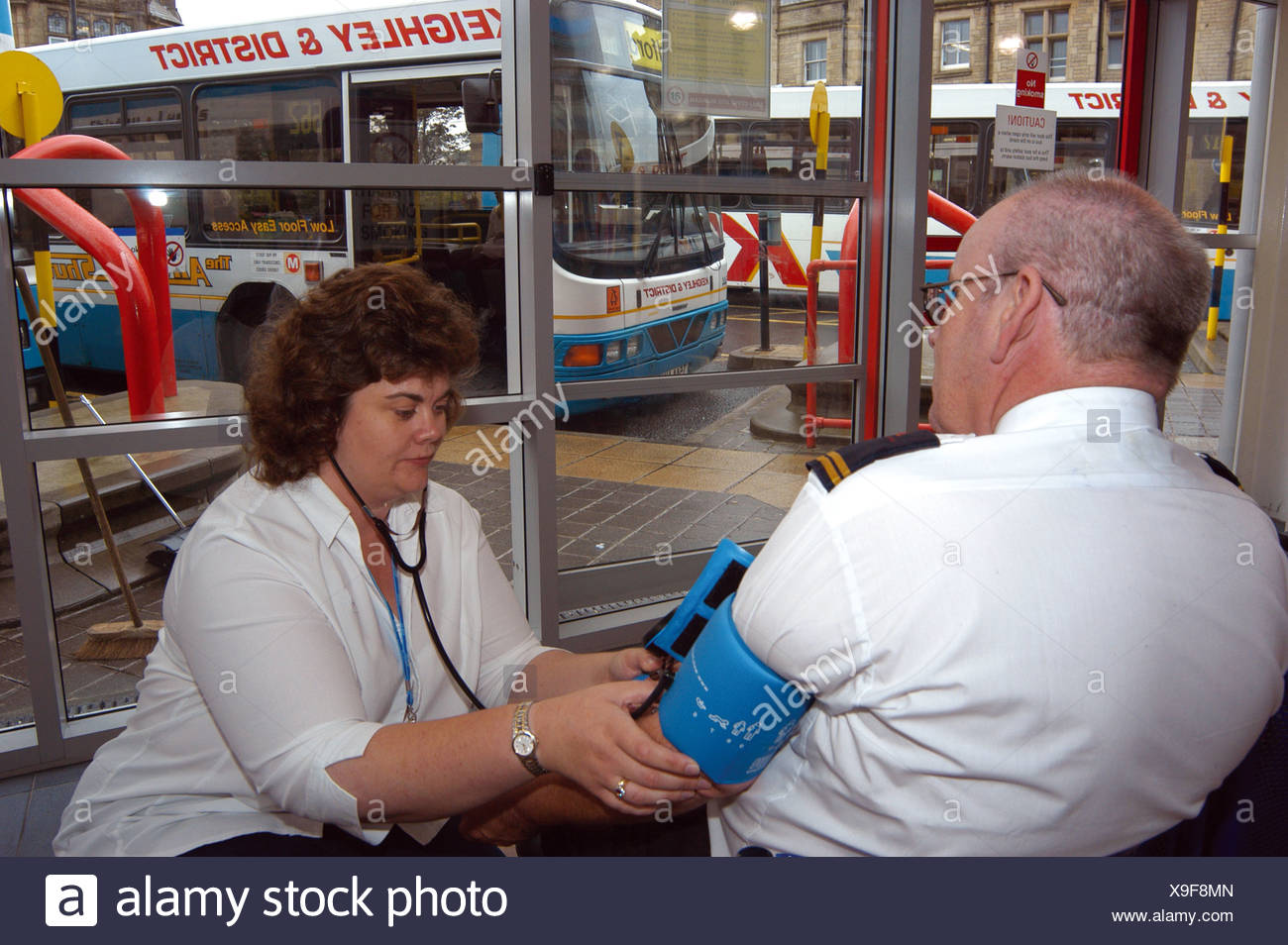 blood-pressure-uk-nurse-high-resolution-stock-photography-and-images