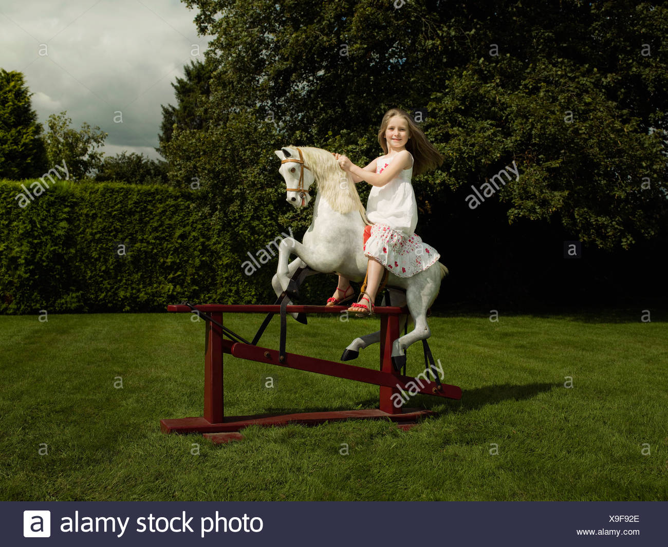 little girl rocking horse