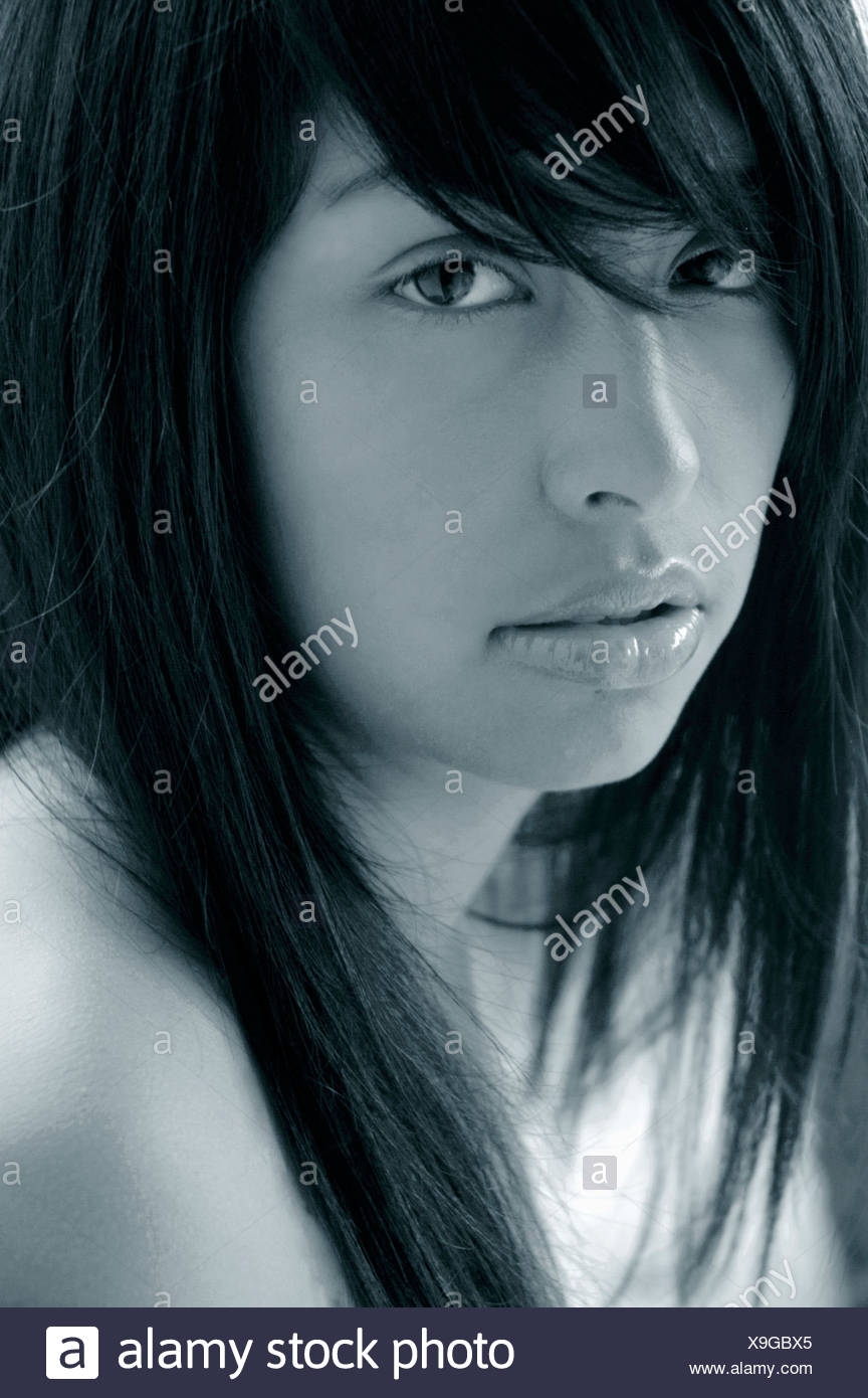 Female With Long Brunette Straight Hair Semi Profile Looking At