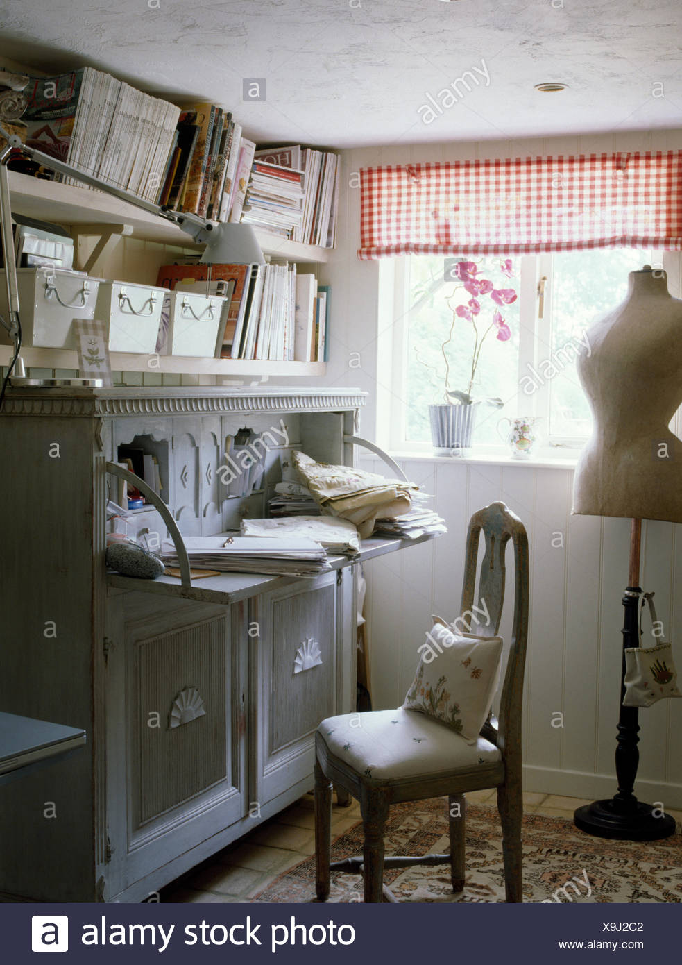 Tailor S Dummy In Small Sewing Room With Painted Cabinet Below