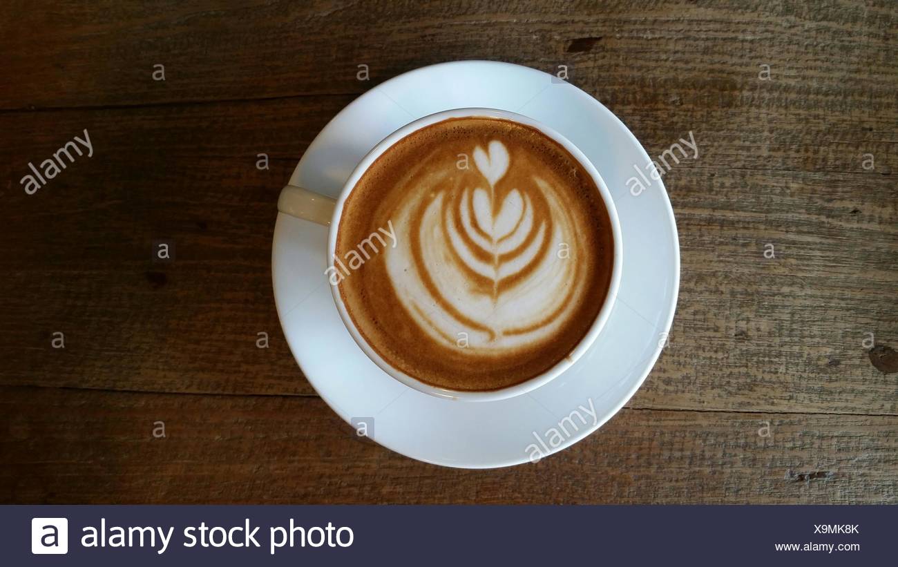 Directly Above View Of Coffee With Latte Art On Table Stock Photo