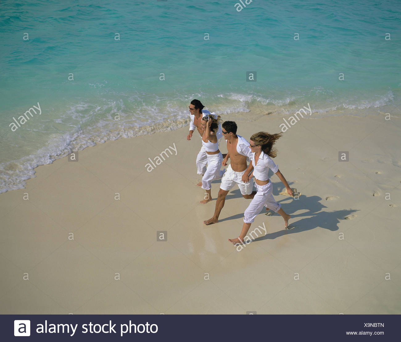 Couples Young Beach Run From Above Model Released Men Women Couples Young Beach Run From Above Model Released Men Women
