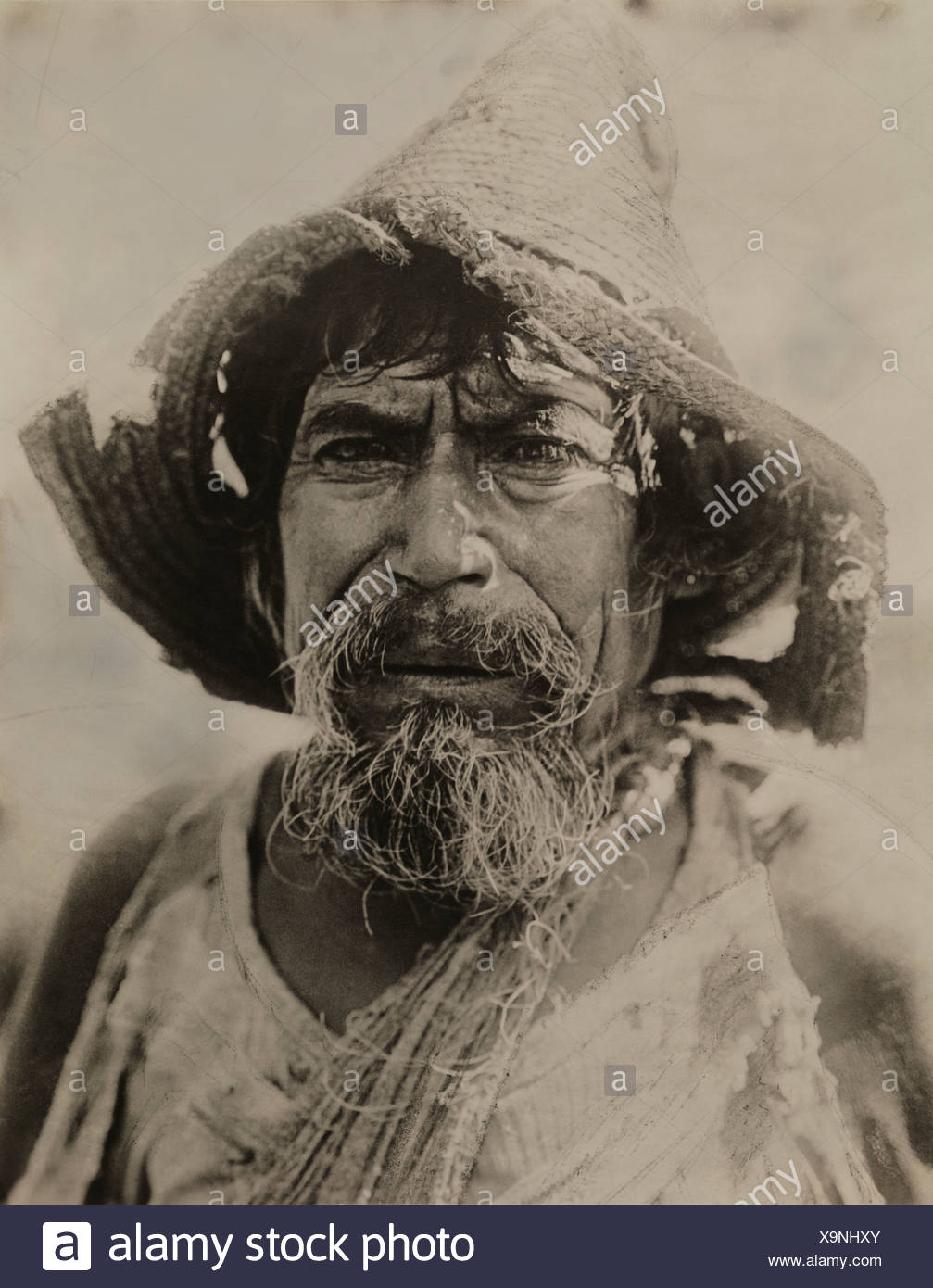 Portrait of a working-class Costa Rican man, his hat worn through ...