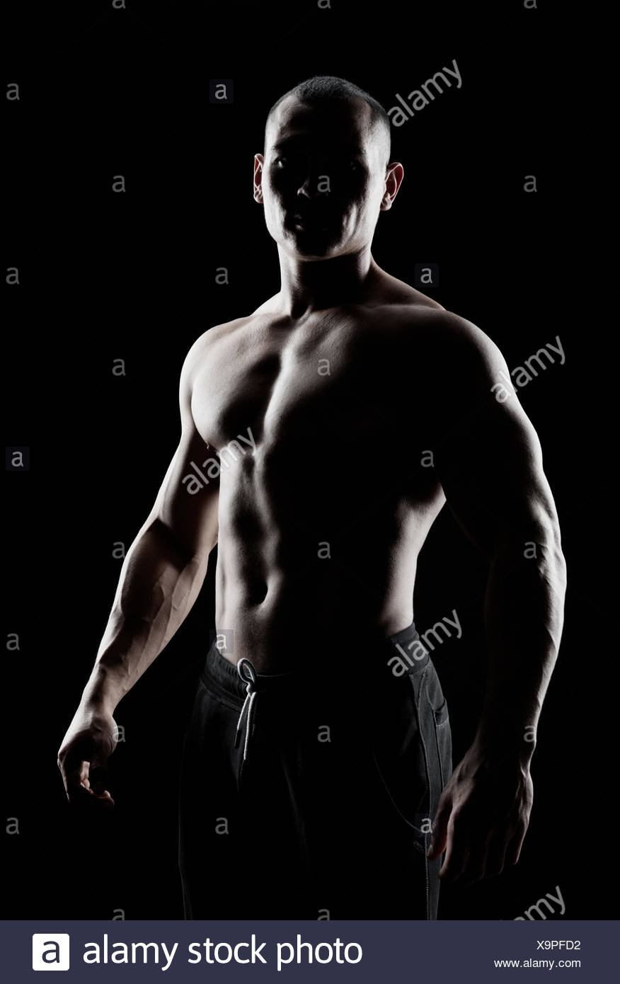 Silhouette Of A Strong Man Stock Photo Alamy