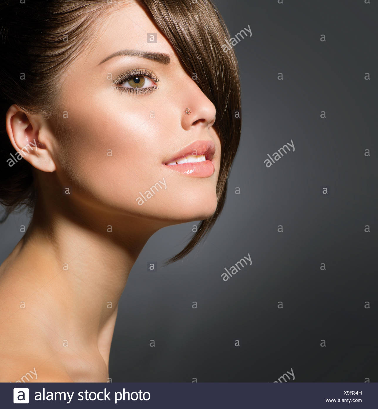Stylish Fringe Teenage Girl With Short Hair Style Stock
