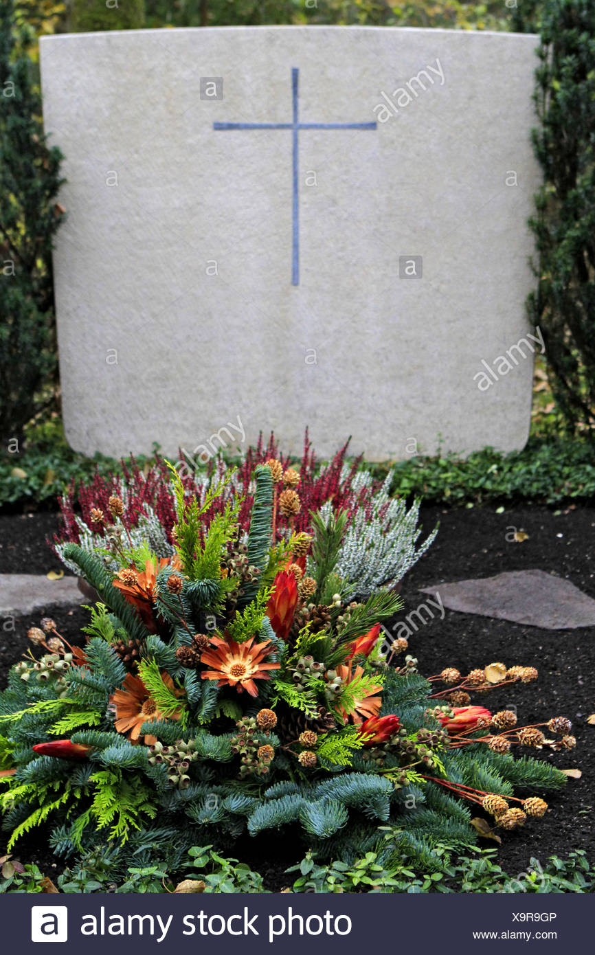 Geschmuecktes Grab auf einem Friedhof an Allerheiligen Stock Photo