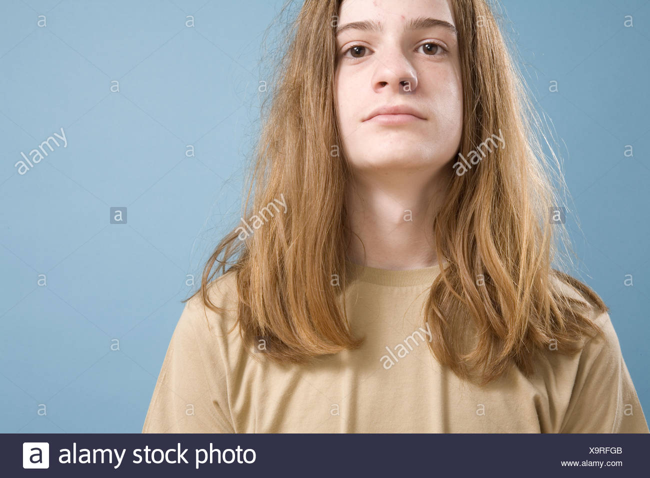 Teen Boy With Long Hair Stock Photo 281414907 Alamy