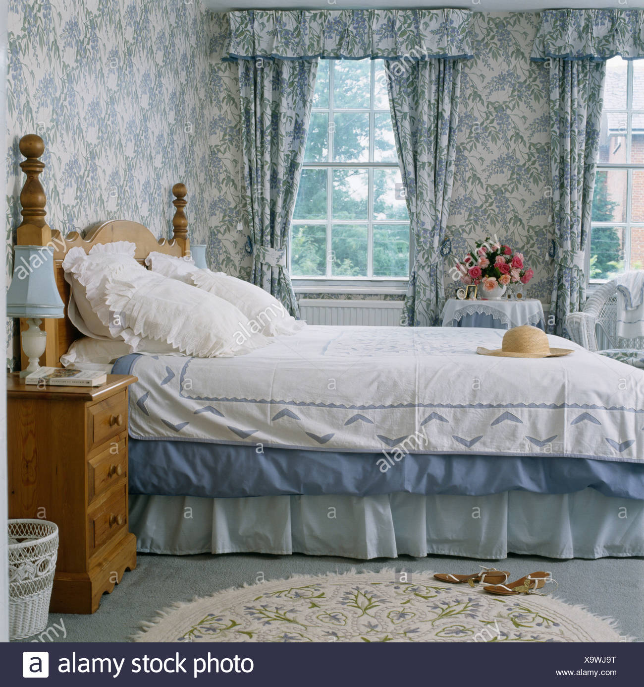 Blue White Wallpaper And Matching Curtains In Traditional Country Bedroom White Lace Pillows And White Duvet On Bed Stock Photo Alamy Blue White Wallpaper And Matching Curtains In Traditional Country Bedroom White Lace Pillows And White Duvet On Bed Stock Photo Alamy