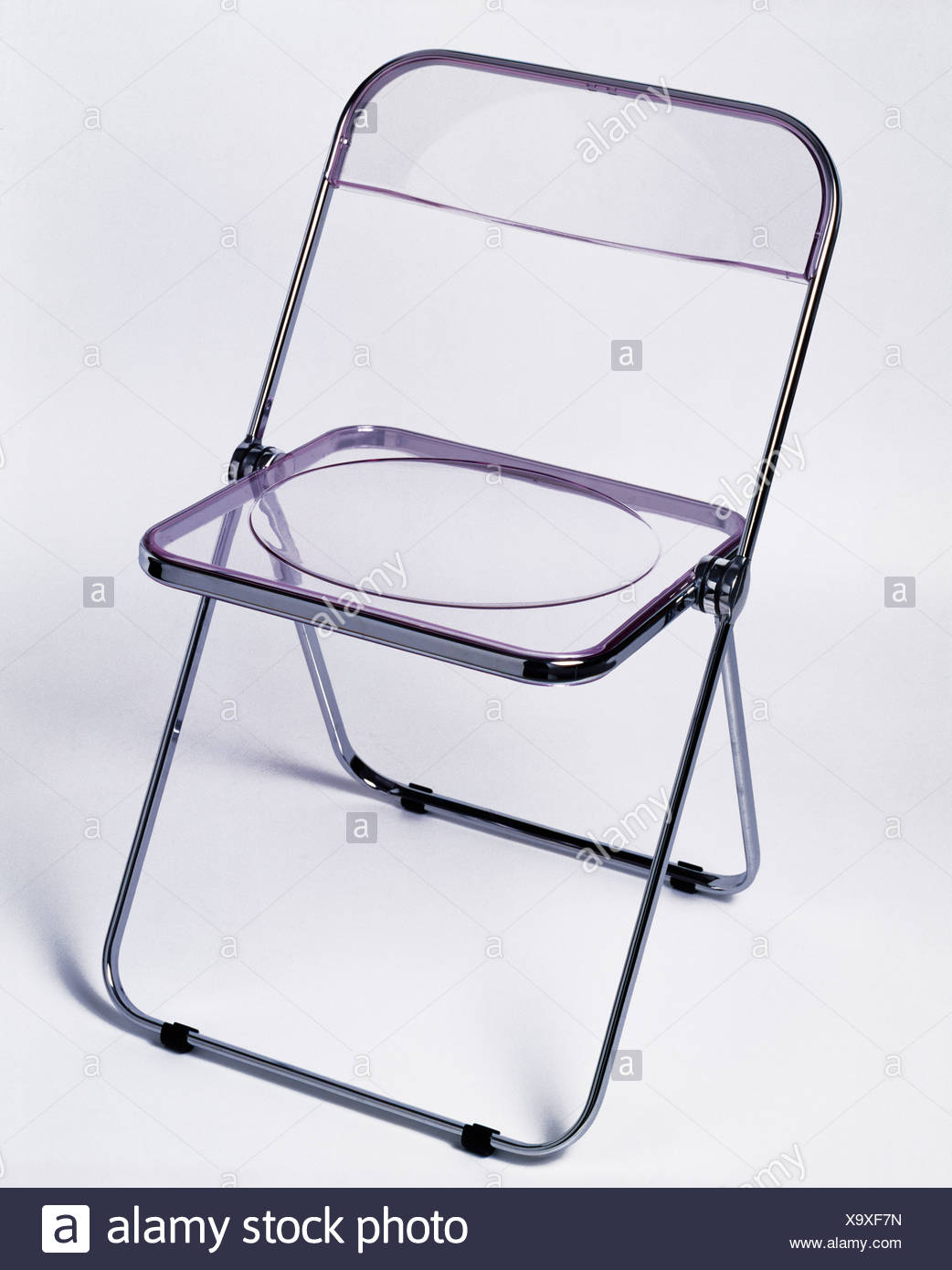 Close Up Of Clear Plastic Giancarlo Piretti Plia Chair Stock