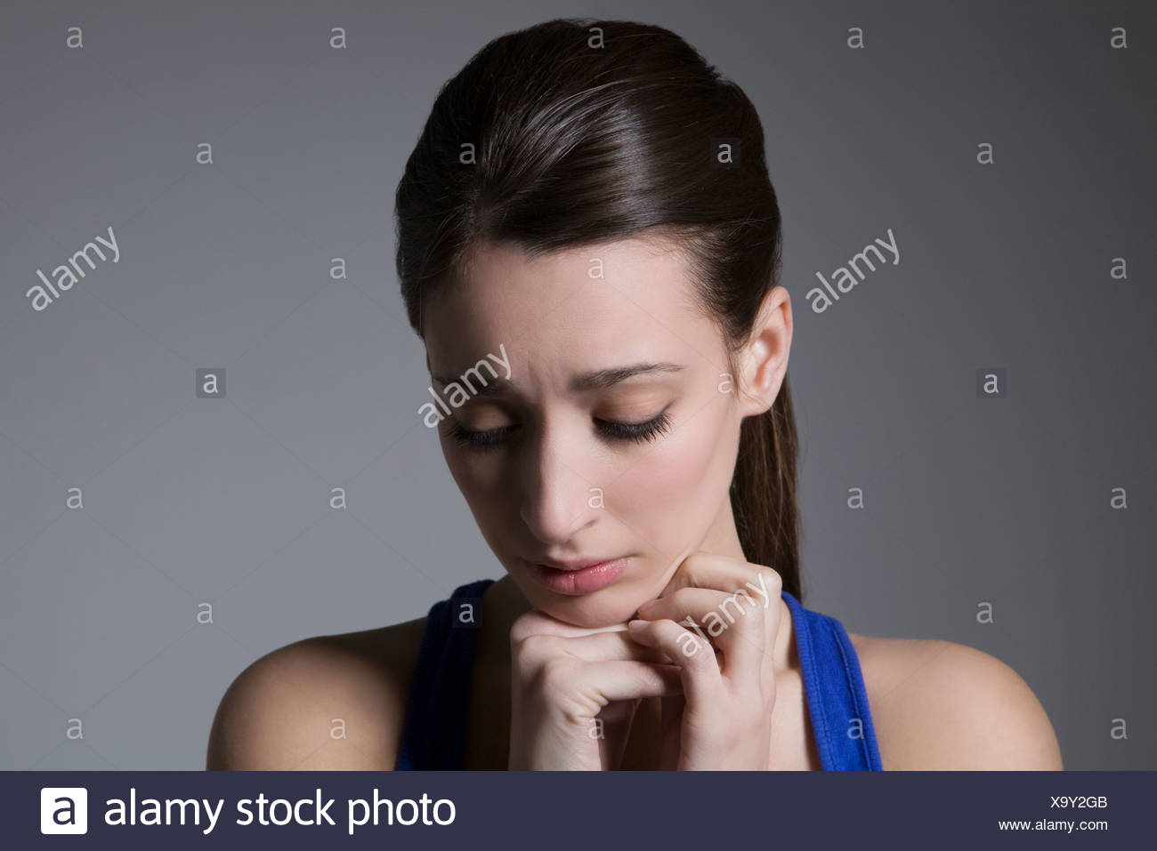 Head Tilted Down High Resolution Stock Photography And Images Alamy